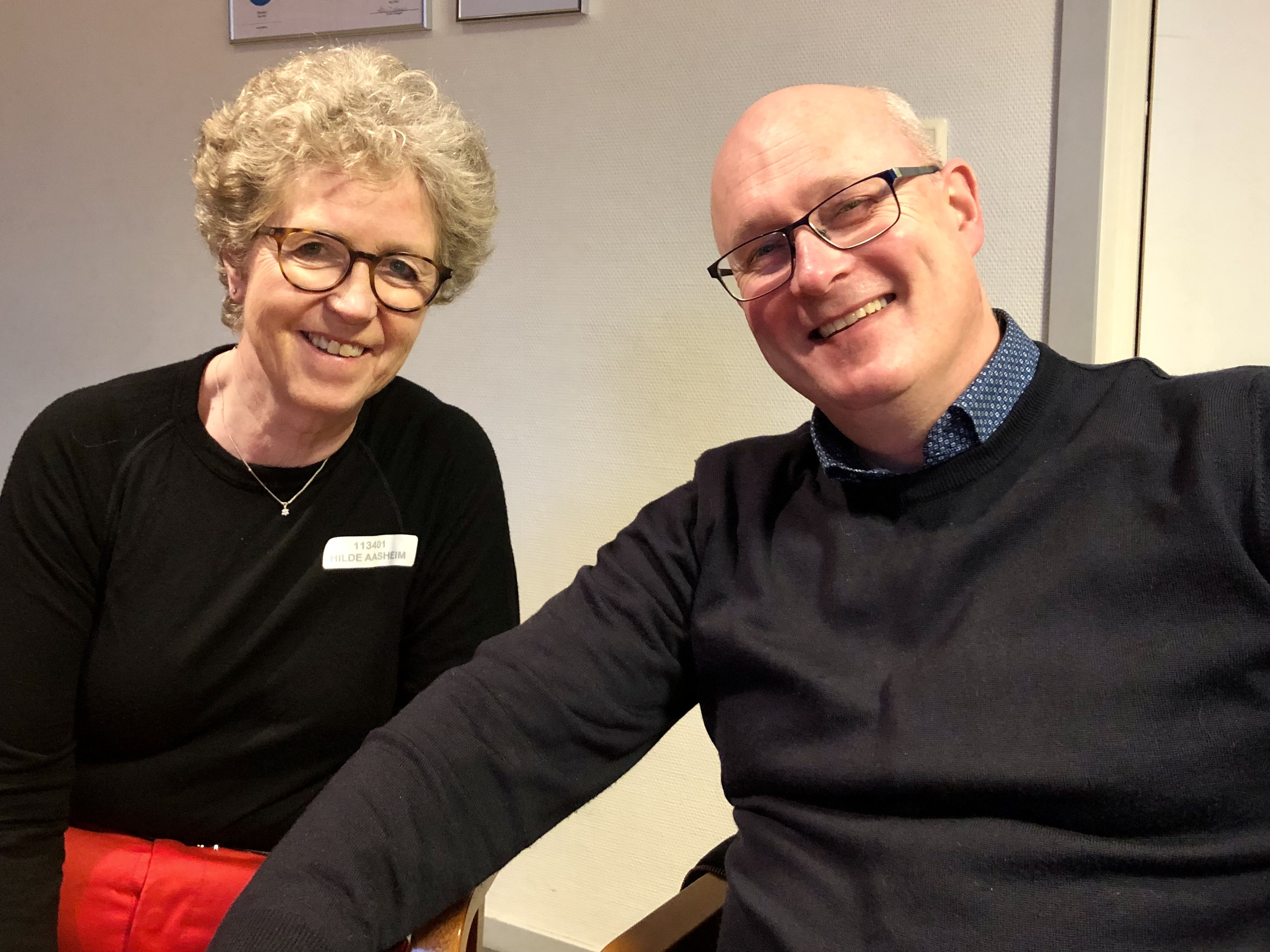 a man and woman smiling